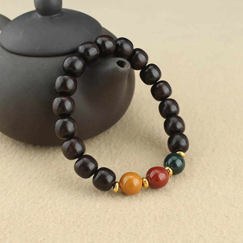 Rainwood Stillness – Purple Sandalwood Bead Bracelet