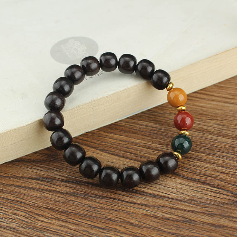 Rainwood Stillness – Purple Sandalwood Bead Bracelet